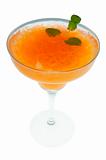 orange cocktail with mint leaf