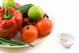 fresh vegetables against vitimin pill