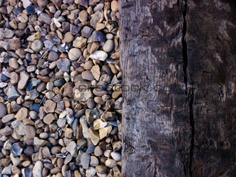 Close up of stones and railway sleeper