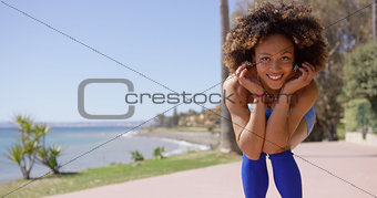 Smiling girl posing on beach