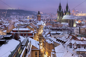 Winter in Prague - city panorama with Tyn Cathedral and Clock To