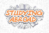Studying Abroad - Doodle Orange Text. Business Concept.