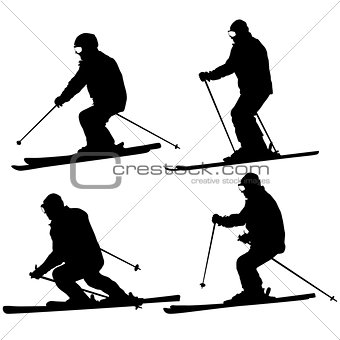 Set mountain skier speeding down slope. Vector sport silhouette