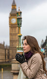 Woman Drinking Coffee on Westminster Bridge, Big Ben, London, En