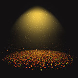 Gold star confetti under a spotlight 