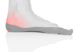 Therapeutic tape on female heel.