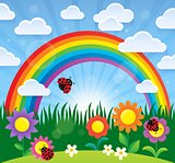 Spring theme with flowers and rainbow