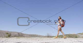 Young female tourist walking