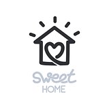 Simple icon of house with heart shape within.