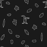 Seamless black and white kids tribal vector pattern with penguins and low-poly crystals.