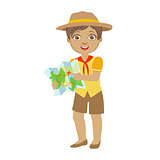 Cute boy scout holding a tourist map, a colorful character