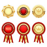 Red award rosettes and gold heraldic medals and insignia