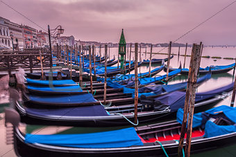Gondolas in Venice at sunrise