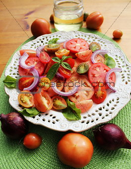 salad of fresh tomatoes with basil and olive oil