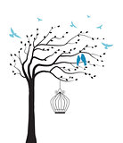Tree with bird and cage