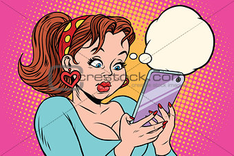 Young woman reading message on mobile