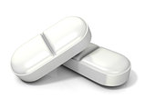 Two white medicine pills - tablets. 3D