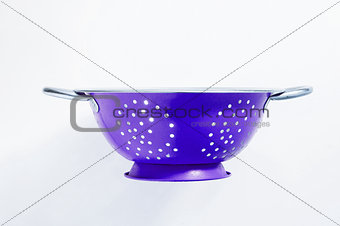 Old metal colander sieve isolated on white background