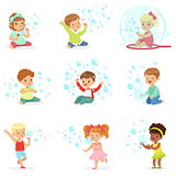 Children playing with colorful soap bubbles, holiday show of soap bubbles at a children party