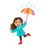 Girl Dancing Under Raindrops With Umbrella, Kid In Autumn Clothes In Fall Season Enjoyingn Rain And Rainy Weather, Splashes And Puddles