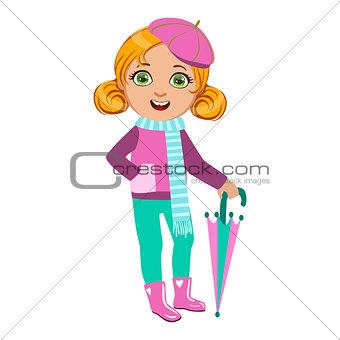 Girl In Pink And Blue Outfit, Kid In Autumn Clothes In Fall Season Enjoyingn Rain And Rainy Weather, Splashes And Puddles