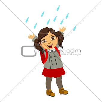 Girl In School Uniform, Kid In Autumn Clothes In Fall Season Enjoyingn Rain And Rainy Weather, Splashes And Puddles