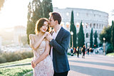 Wedding couple fineart walk outside Rome colosseum