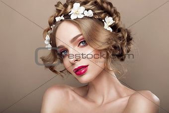Fashion Beauty Model Girl with Flowers Hair. Bride. Perfect Creative Make up and Hair Style. Hairstyle.
