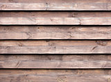 Texture of a wooden fence with a new horizontal brown background