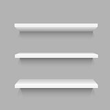 Three simple white shelves