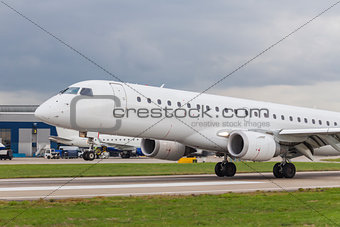 Commercial Jet Airplane Landing on an Airport Runway