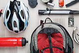 Cyclist accessories on wooden background