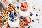 Delicious plain yogurt with fresh blueberry and strawberry in a 