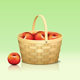 basket with red apples and reflection