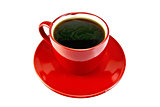 Coffee in red cup on saucer