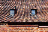 Tiled roof with dormers in Gdansk, Poland.
