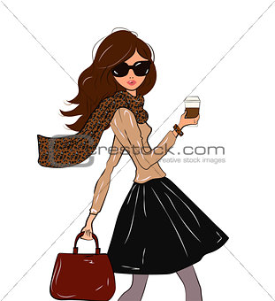 Fashionable cute girl in cravat with leopard print and black midi skirt with a coffee in her hand walking down the street