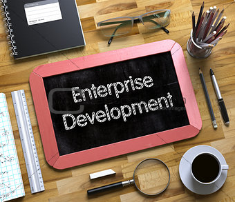 Enterprise Development - Text on Small Chalkboard. 3d.