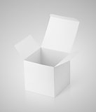 Open white cardboard box on gray