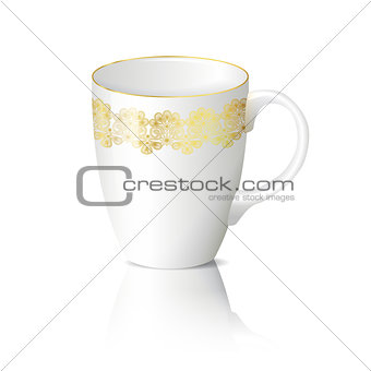 white cup with gold ornaments with reflection