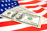 American dollars and flag.