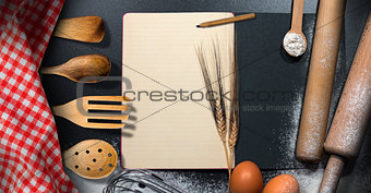 Empty Recipe Book on a Baking Background