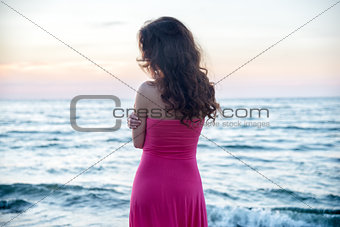 Woman standing on the sea