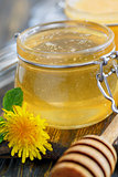 Linden honey in glass jar
