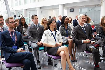 Audience Listening To Speaker At Conference Presentation