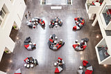 Student groups on seating in a modern university atrium