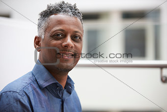 Head and shoulders portrait of a middle aged black man