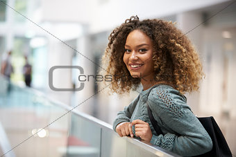 Smiling mixed race young woman looking to camera