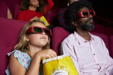 Audience In Cinema Wearing 3D Glasses Watching Comedy Film