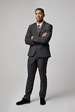 Studio Portrait Of Businessman Wearing Suit